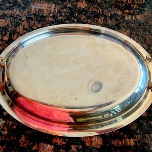 Silver serving plate . 12 Inches long with cover. We’ll maintained